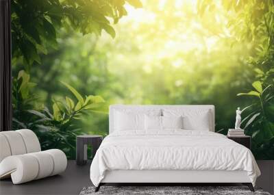 Lush green foliage illuminated by soft sunlight, creating a serene and tranquil nature scene perfect for relaxation and inspiration. Wall mural