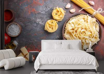 top view sliced raw dough inside plate on a dark background dough pasta dark food Wall mural