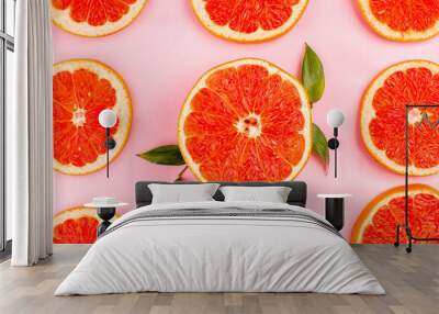 top view tasty grapefruits sliced juicy fruits lined on pink desk healthy life juice fresh color diet fruit Wall mural