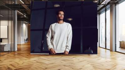 Man in white blank sweatshirt. Mock-up. Wall mural