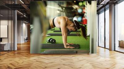 A portrait of an Thai woman working on in the gym Wall mural