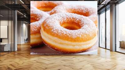 Delicious sugar-dusted donut on a plate, perfect for desserts, treats, or breakfast. A sweet indulgence for any occasion. Wall mural