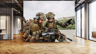 commander of the soldiers paves the route on an electronic table Wall mural