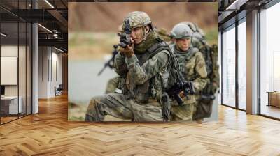 Portrait of a ranger in the battlefield with a gun Wall mural