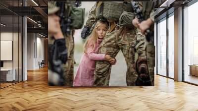 Soldier and children on battlefield background. Wall mural