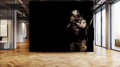 soldiers or private military contractors holding rifle. Image on a black background. war, army, weapon, technology and people concept Wall mural