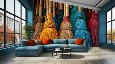 Colorful brooms arranged together, showcasing a vibrant array of hues and textures. Perfect for artistic and decorative themes. Wall mural