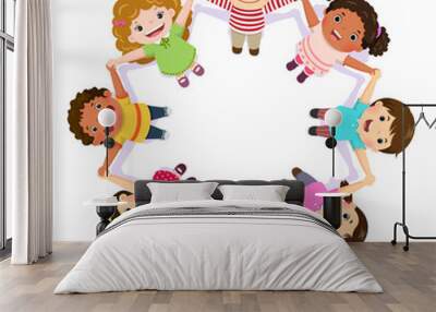 Children holding hands in a circle Wall mural