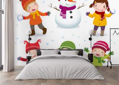 collection of kids with snowman in winter costume Wall mural