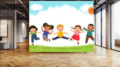 Happy kids jumping together during a sunny day Wall mural