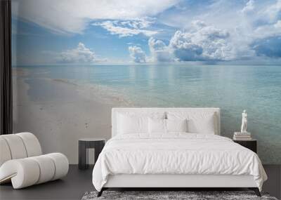 Paradise white sand beach and blue sky in sandbank island, Maldives. Wall mural