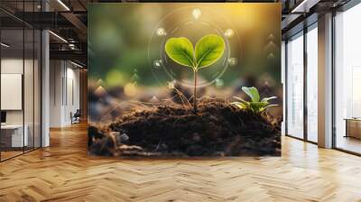 Green plant growing in soil with green nature background. Renewable eco energy concept. Wall mural