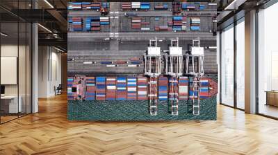 Industrial import-export port prepare to load containers. Aerial top view container ship in export and import global business and logistic. Global transportation and logistic business. Wall mural