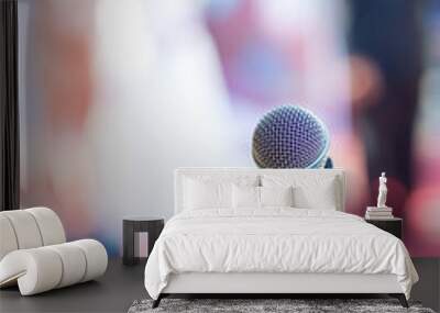 microphone in concert hall or conference room soft and blur style for background.Microphone over the Abstract blurred photo of conference hall or seminar room background. Wall mural