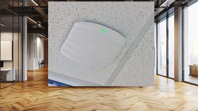 wireless router for network, hang on the ceiling. world wide network technology. WIFI router or Wireless Access Point setup at ceiling for Internet connection space. Wall mural