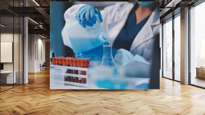 Group of dedicated scientist conduct chemical experiment in medical laboratory, carefully drop precise amount of liquid from pipette into test tube for vaccine drug or antibiotic development. Neoteric Wall mural