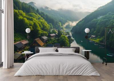 A beautiful mountain valley with houses and boats on the water Wall mural