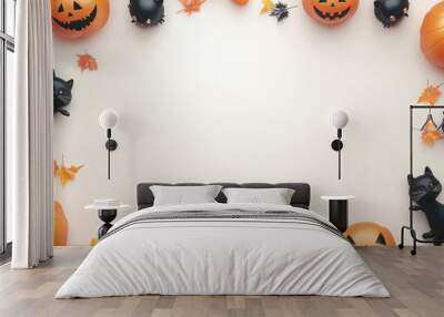 A frame made of spooky Halloween decorations, with pumpkins and black cats at the corners. Wall mural