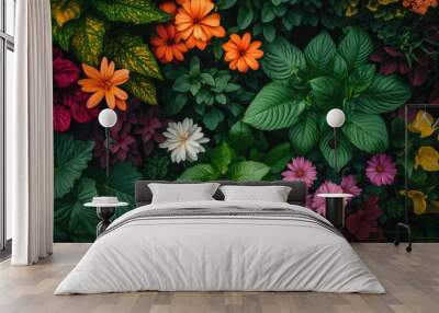 A lush green plant with a variety of colorful flowers Wall mural