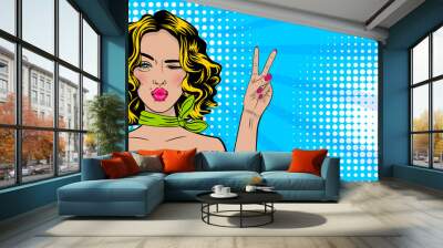 beautiful sexy blonde winkle positive girl show peace symbol two fingers, pink lips style pop art. c Wall mural