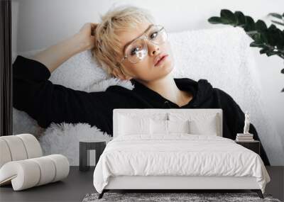 Beautiful young adult blonde woman Wall mural