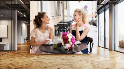 two beautiful young women Wall mural