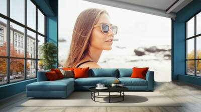 woman fresh face smiling on the beach of tropic island Wall mural