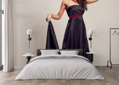 woman in long black dress Wall mural