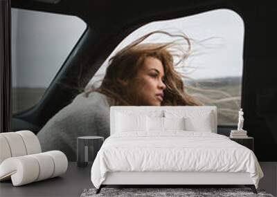 wonderful chilling girl travelling in the car Wall mural