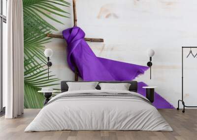 cross with purple sash on white wood background with palms Wall mural