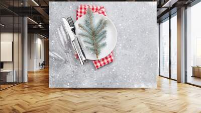 Christmas table setting with plate, silverware Wall mural