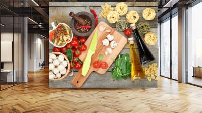 fresh ingredients for cooking: pasta, tomato, mushroom and spice Wall mural