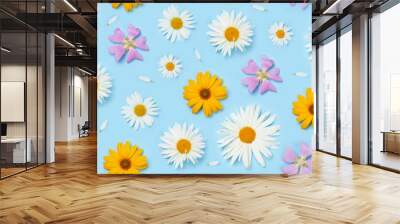 Garden flowers over blue background seamless Wall mural