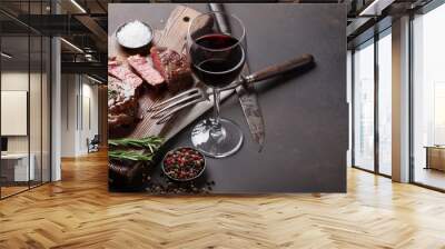 Grilled ribeye beef steak with red wine, herbs and spices Wall mural