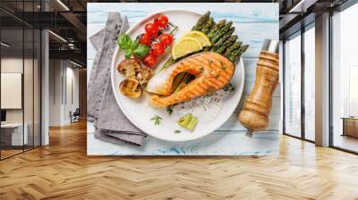 Grilled salmon steak over grilled asparagus, a delicious meal Wall mural