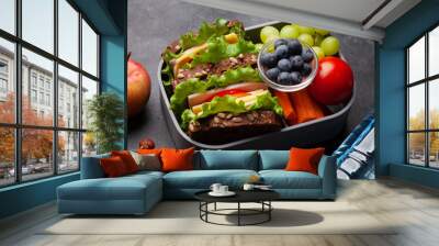 Healthy school lunch box with sandwich and fresh vegetables Wall mural