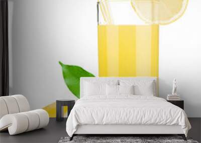 Lemon juice glass and fresh lemons Wall mural