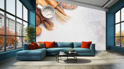 Various bread with wheat, flour and cooking utensils Wall mural