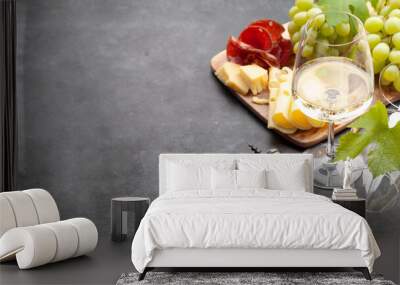 White wine glasses, grape and appetizer board Wall mural