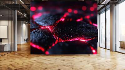 An intense abstract scene featuring a dark, cracked surface illuminated by vibrant red light seeping through the crevices. The glowing effect and rugged texture evoke a sense of heat and raw energy. Wall mural