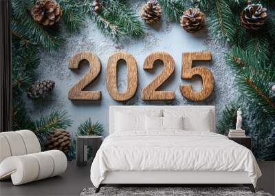 Fir tree branches framing 2025 sign on white background Wall mural