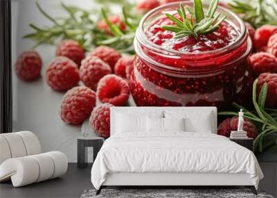 Raspberry jam with fresh raspberries and rosemary sprigs on white rustic table Wall mural