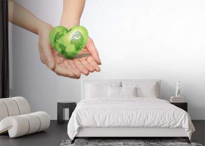 Future of green world is in our hands, save Earth and Earth day concept, Hand holding Green heart with World map in side on white background Wall mural