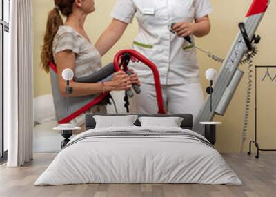 Nurse with young disabled patient in clinic. Wall mural