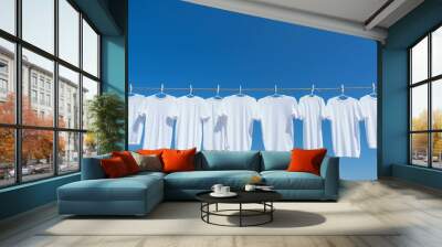 Row of white t-shirts on a clothesline Wall mural