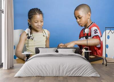 boy and girl playing Wall mural