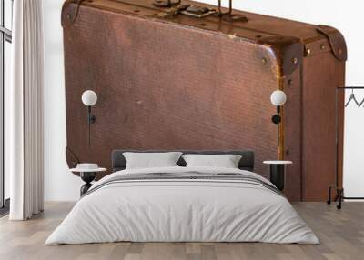 Old shabby vintage suitcase isolated on white background. Retro style. Wall mural