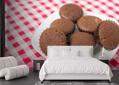 Mini cocoa muffins (snack) on plate Wall mural