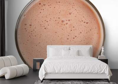 Chocolate milkshake top view isolated on white Wall mural