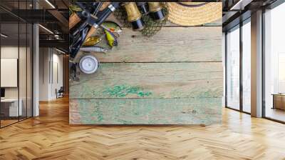 fishing tackle on a wooden table.  Wall mural